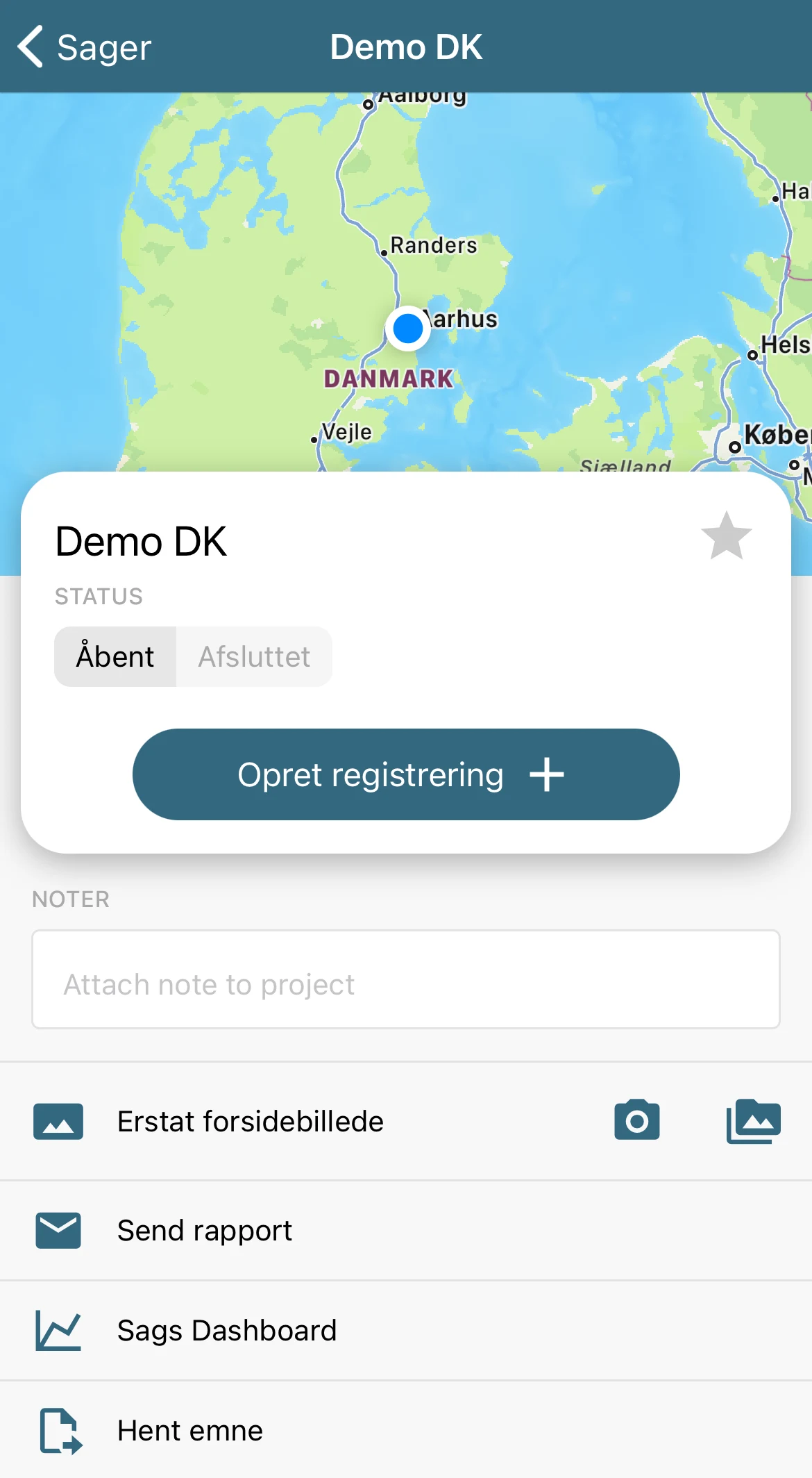 QReport på mobil: sagen Demo DK vist på et kort med knappen Opret registrering og menupunkter for Send rapport og Sags Dashboard.